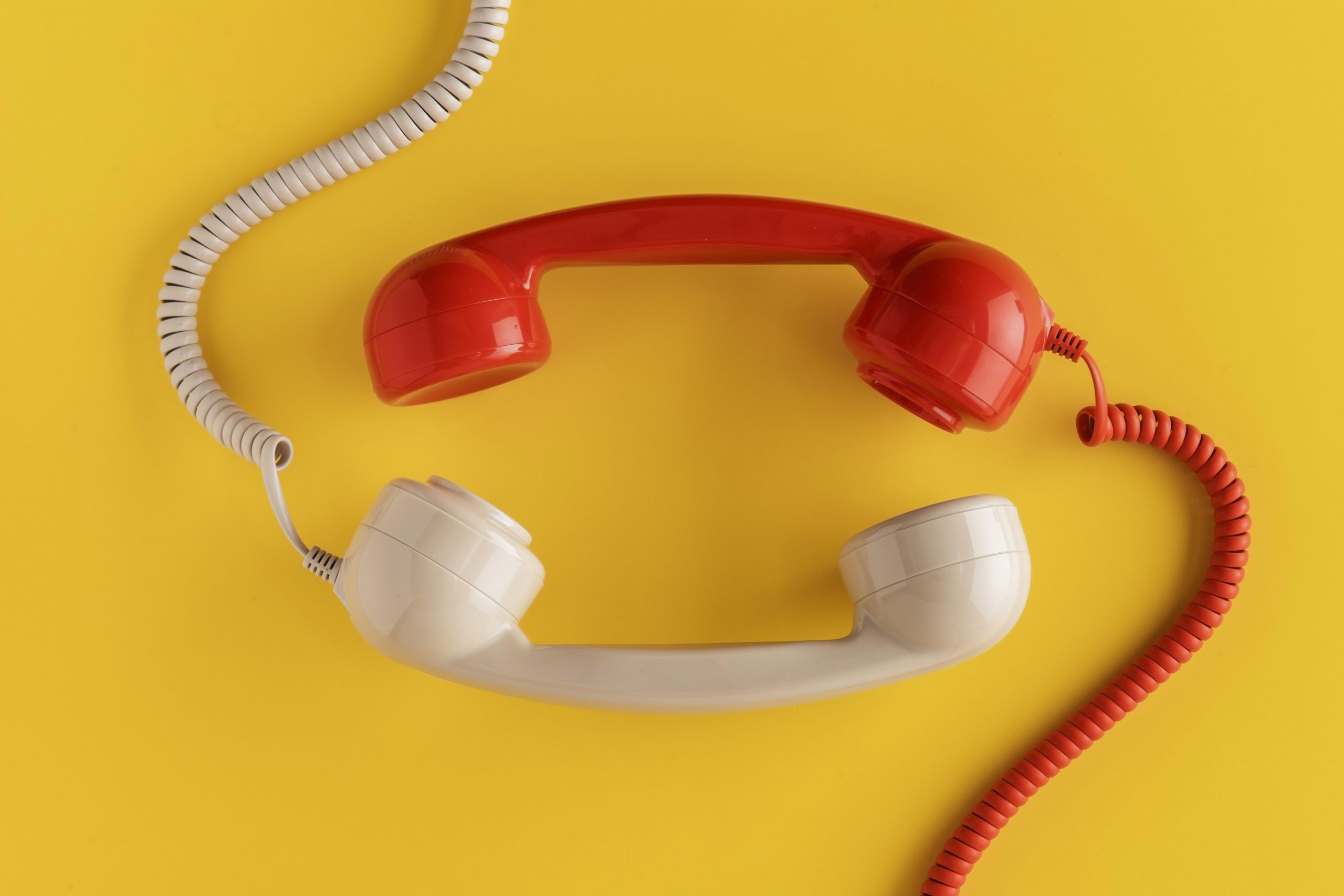 top-view-vintage-telephone-receivers-with-cord